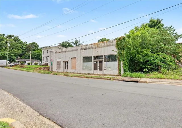 Photo 2 of Multi family home for sale at 115 N Flanner St, Burlington, NC 27217 | MLS# 1229420 | Listing updated on 2026-09-09