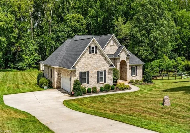 Photo 2 of Single family home for sale at 592 Carson Ridge Dr, Oak Ridge, NC 27310 | MLS# 1228618 | Listing updated on 2026-10-07