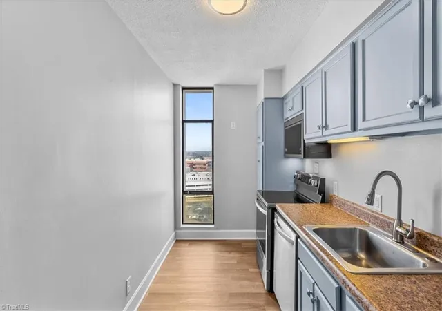 Photo 3 of Single family home for sale at 1101 N Elm St #1404, Greensboro, NC 27401 | MLS# 1211547 | Listing updated on 2026-09-16