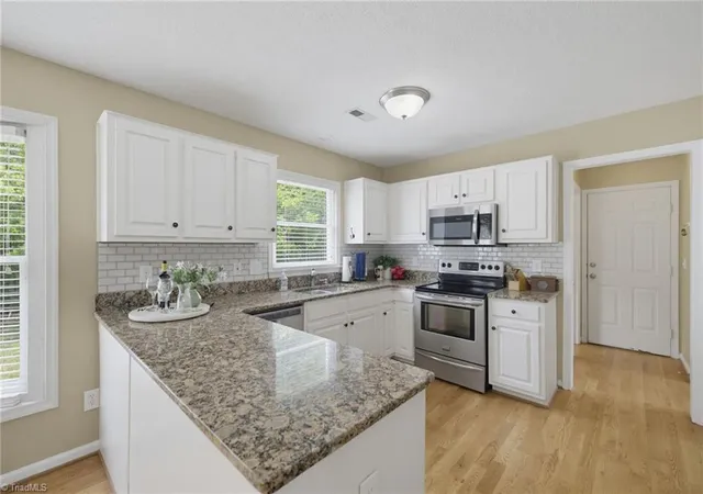 Photo 3 of Single family home for sale at 3312 Stable Ct, Greensboro, NC 27410 | MLS# 1228690 | Listing updated on 2026-09-22