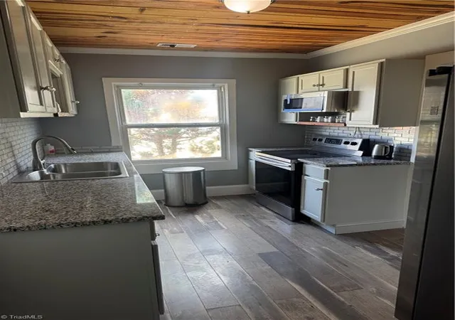 5th image of 5719 Hackney Rd, Greensboro, NC 27409 | MLS# 1211791