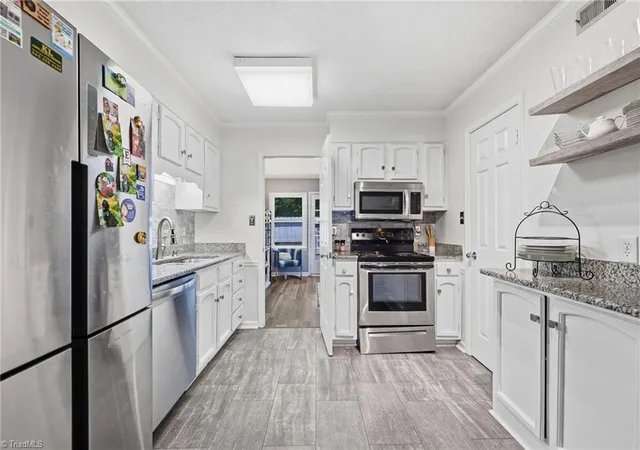 Photo 4 of Single family home for sale at 4932 Tower Rd #C, Greensboro, NC 27410 | MLS# 1227892 | Listing updated on 2026-09-19