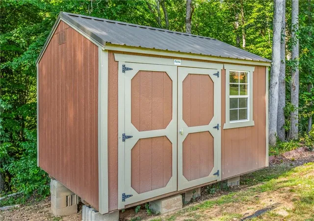 Photo 42 of Single family home for sale at 1080 Nauvoo Ridge Dr, Tobaccoville, NC 27050 | MLS# 1233782 | Listing updated on 2026-08-28