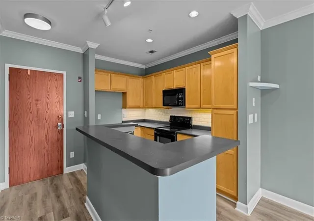 Photo 3 of Single family home for sale at 411 W Washington St #108, Greensboro, NC 27401 | MLS# 1230298 | Listing updated on 2026-09-21