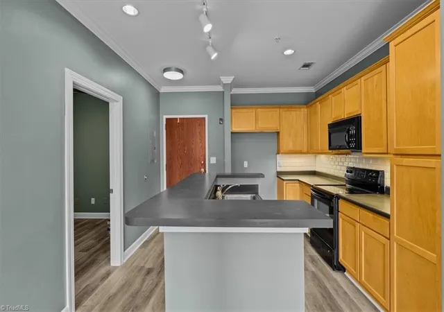 Photo 4 of Single family home for sale at 411 W Washington St #108, Greensboro, NC 27401 | MLS# 1230298 | Listing updated on 2026-09-21