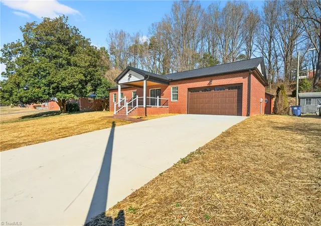 Photo 3 of Single family home for sale at 1256 Cloister Dr, Winston Salem, NC 27127 | MLS# 1229541 | Listing updated on 2026-09-24