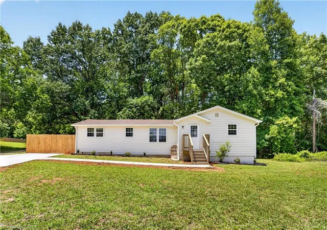 Homes for sale in Whitsett, NC | 1724 Rock Creek Dairy Rd, Whitsett, NC 27377 | MLS# 1226579