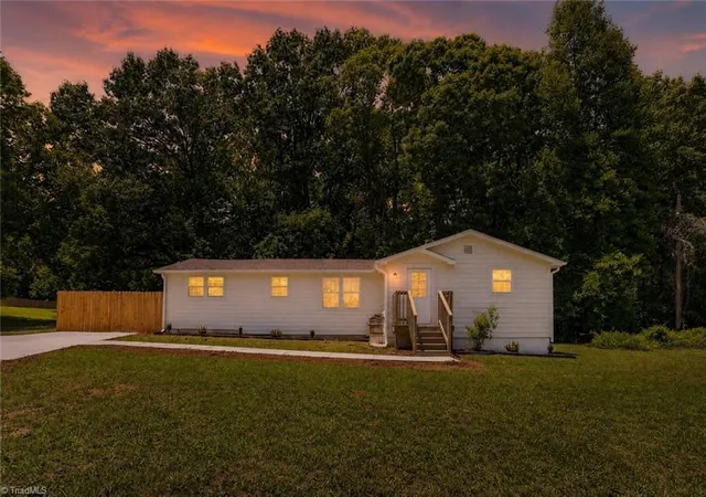 Homes for sale in Whitsett, NC | 1724 Rock Creek Dairy Rd, Whitsett, NC 27377 | MLS# 1226579