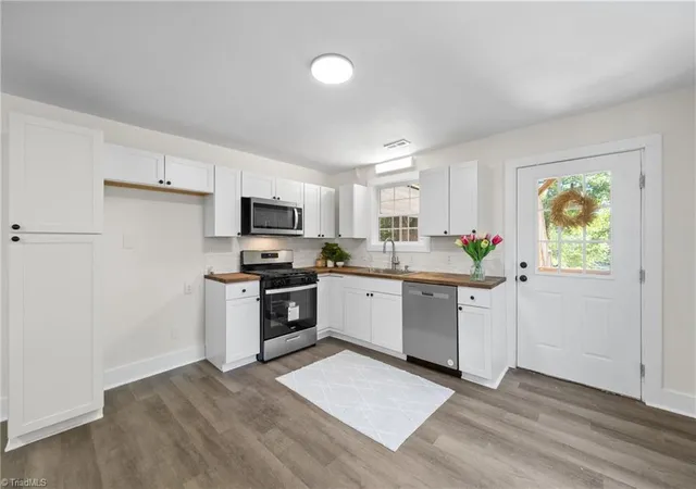 Photo 2 of Single family home for sale at 1037 Madison Ave, Winston Salem, NC 27103 | MLS# 1225800 | Listing updated on 2026-10-21