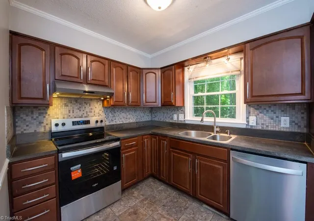 Photo 3 of Single family home for sale at 5809 Carriage Ln, Greensboro, NC 27410 | MLS# 1234118 | Listing updated on 2026-09-17