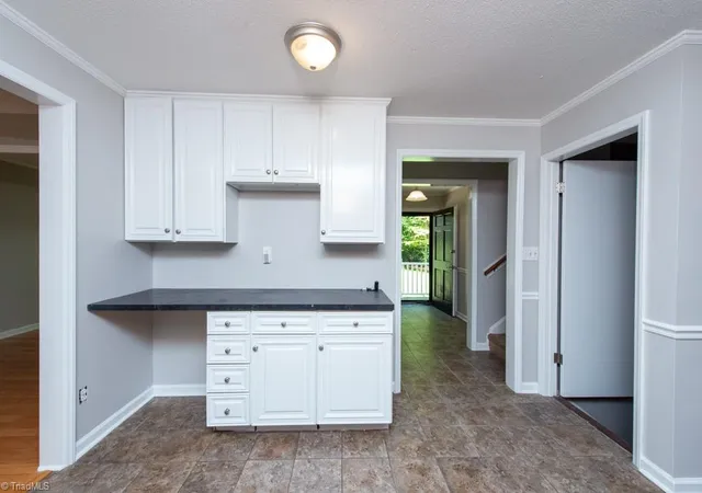 Photo 4 of Single family home for sale at 5809 Carriage Ln, Greensboro, NC 27410 | MLS# 1234118 | Listing updated on 2026-09-17