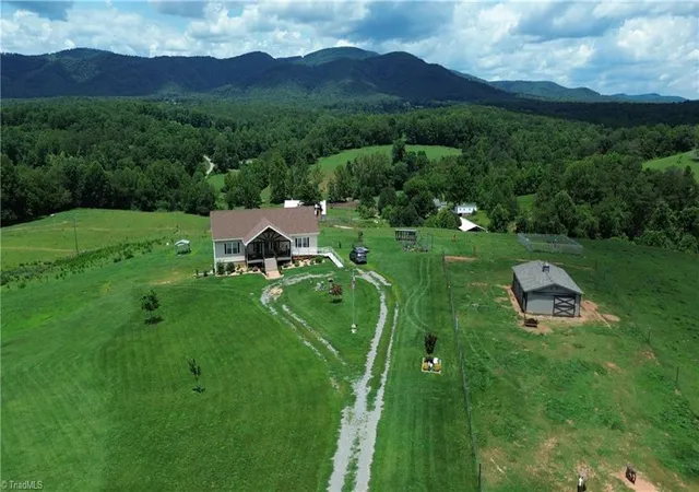 Photo 1 of Single family home for sale at 310 Triple Crk Dr, Traphill, NC 28685 | MLS# 1226120 | Listing updated on 2026-09-02