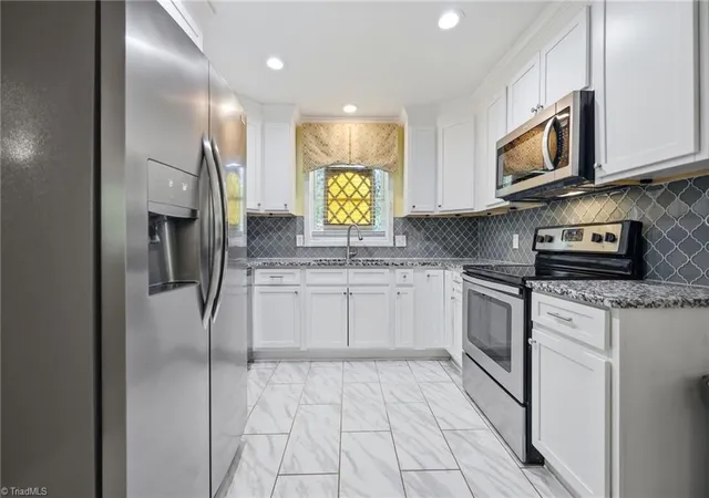 Photo 3 of Sale Pending at 403 Springtime Dr, Greensboro, NC 27409 | MLS# 1227567 | Listing updated on 2026-09-05