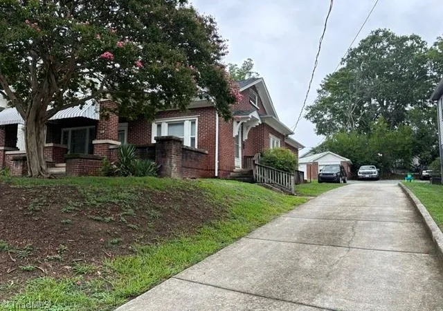 Photo 3 of Multi family home for sale at 410 N Cedar St, Greensboro, NC 27401 | MLS# 1229313 | Listing updated on 2026-09-10
