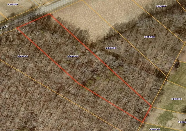 Photo 1 of Land for sale at 8320 Fairgrove Church Rd, Browns Summit, NC 27214 | MLS# 1233883 | Listing updated on 2026-09-02
