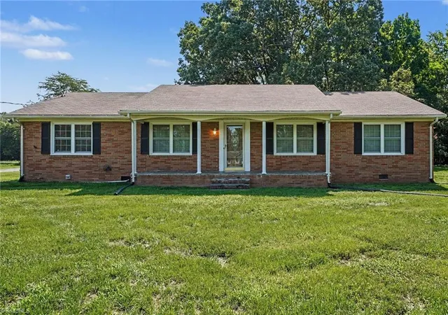 1st image of 801 Woodard Dr, Whitsett, NC 27377 | MLS# 1230866