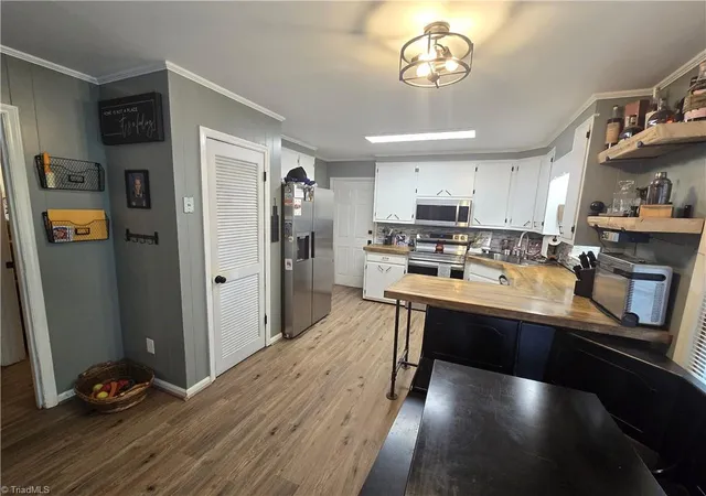 Photo 2 of Single family home for sale at 706 Townbranch Rd, Graham, NC 27253 | MLS# 1218477 | Listing updated on 2026-10-27