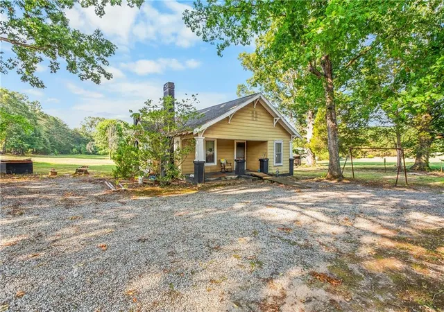 Photo 3 of Single family home for sale at 833 Nc Hwy 150 W, Greensboro, NC 27455 | MLS# 1228410 | Listing updated on 2026-09-01