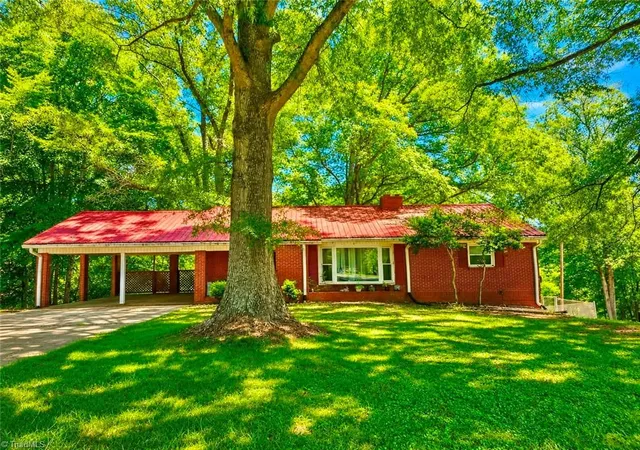 Photo 1 of Single family home for sale at 302 Island Dr, Madison, NC 27025 | MLS# 1227610 | Listing updated on 2026-08-18
