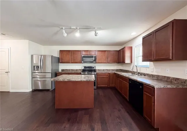 Photo 2 of Single family home for sale at 3423 Anita Glen Dr, Greensboro, NC 27405 | MLS# 1225155 | Listing updated on 2026-10-07