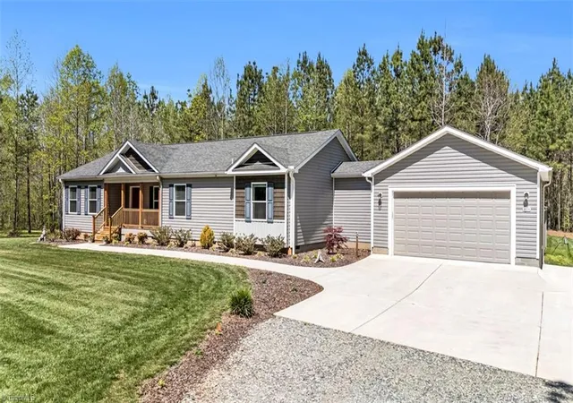 Photo 1 of Manufactured Mobile Home at 8150 High Rock Rd, Efland, NC 27243 | MLS# 1215834 | | Sold on 2026-06-18