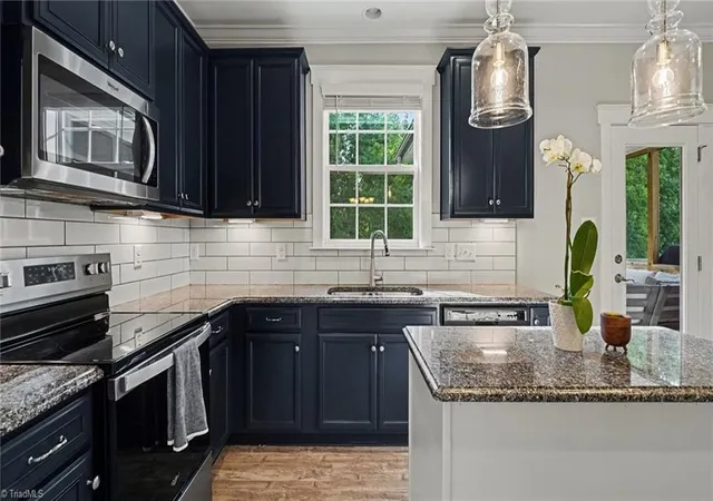 Photo 3 of Single family home for sale at 7611 Mary Ellen Ct, Greensboro, NC 27409 | MLS# 1230537 | Listing updated on 2026-08-30