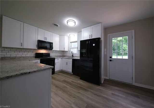 Photo 3 of Single family home for sale at 241 Commonwealth Dr, Winston Salem, NC 27104 | MLS# 1231355 | Listing updated on 2026-09-01
