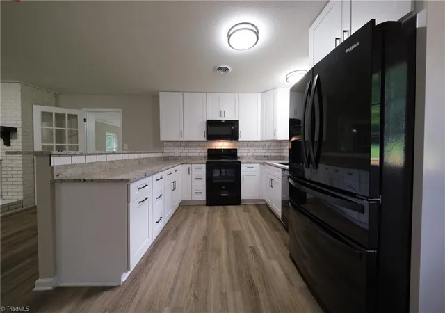 Photo 4 of Single family home for sale at 241 Commonwealth Dr, Winston Salem, NC 27104 | MLS# 1231355 | Listing updated on 2026-09-01