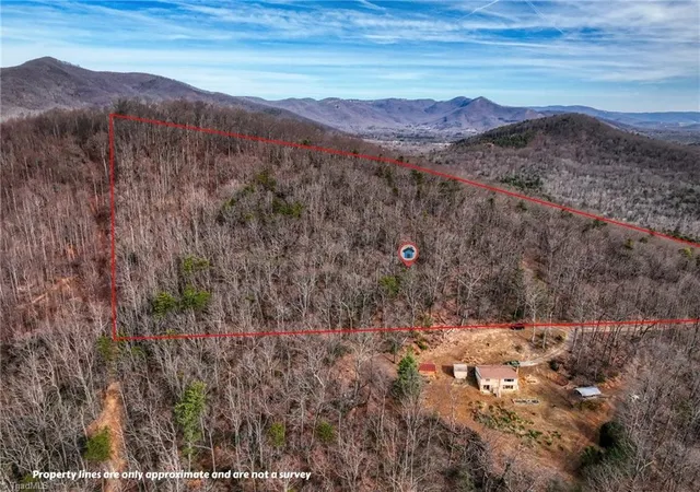 1st image of Tbd Ivy Green Trl, Lowgap, NC 27024 | MLS# 1229901