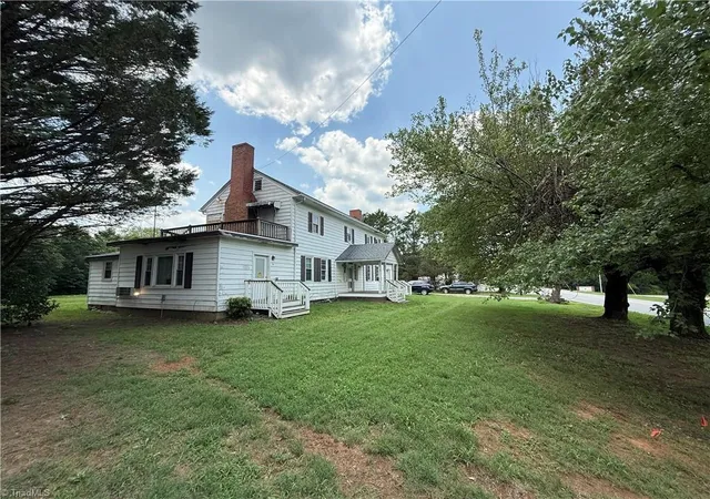 Photo 2 of Multi family home for sale at 1109 W Main St, Yadkinville, NC 27055 | MLS# 1233895 | Listing updated on 2026-09-18