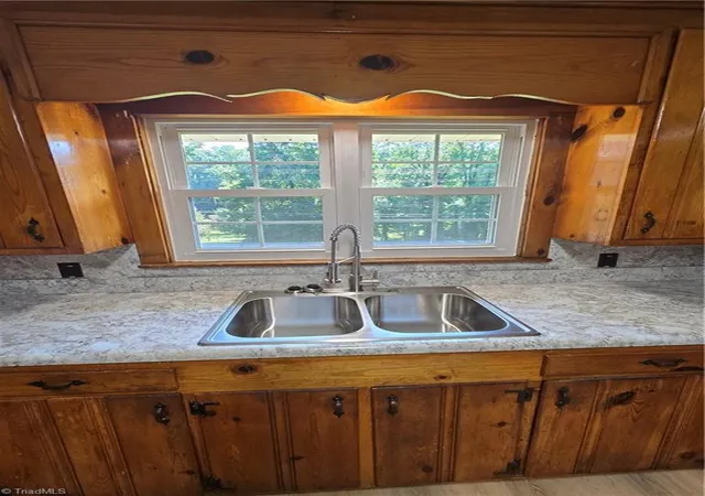 Photo 3 of Single family home for sale at 5167 N Cherry St, Winston Salem, NC 27105 | MLS# 1233308 | Listing updated on 2026-09-17