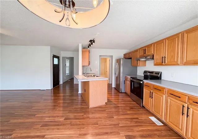 Photo 2 of Single family home for sale at 4635 Leprechaun Ln, Winston Salem, NC 27127 | MLS# 1231176 | Listing updated on 2026-09-17