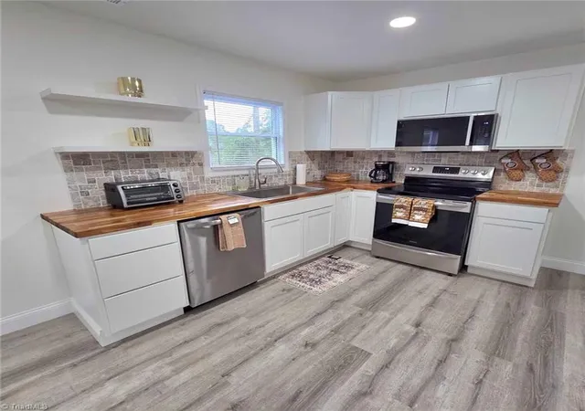 Photo 1 of Single family home for sale at 1418 24th Street, Winston Salem, NC 27105 | MLS# 1229250 | Listing updated on 2026-09-01