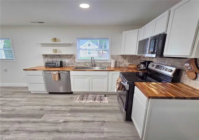 Photo 2 of Single family home for sale at 1418 24th Street, Winston Salem, NC 27105 | MLS# 1229250 | Listing updated on 2026-09-01