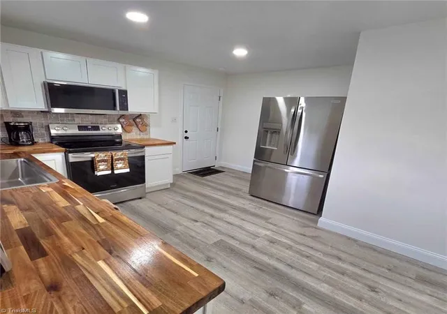 Photo 3 of Single family home for sale at 1418 24th Street, Winston Salem, NC 27105 | MLS# 1229250 | Listing updated on 2026-09-01