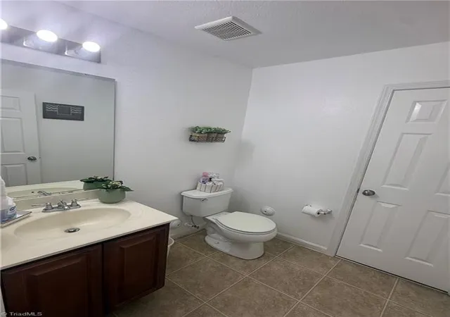 Photo 3 of Single family home for sale at 5715 Fisherman Dr, Browns Summit, NC 27214 | MLS# 1221883 | Listing updated on 2026-09-23