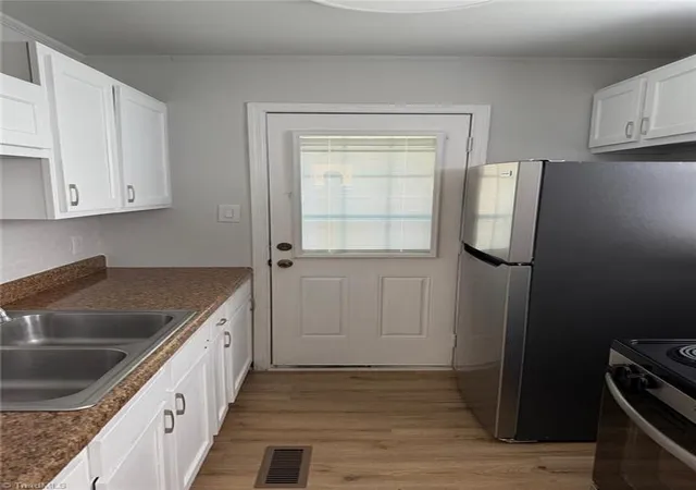 Photo 3 of Single family home for sale at 1323 Mayfair Ave, Greensboro, NC 27405 | MLS# 1227490 | Listing updated on 2026-08-14
