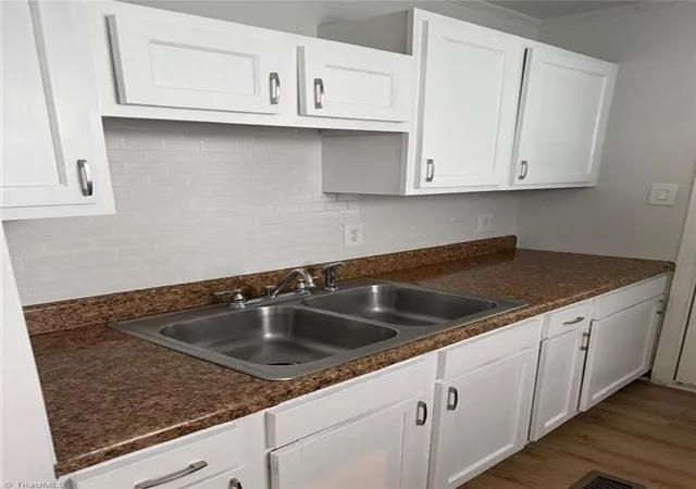 Photo 3 of Single family home for sale at 1323 Mayfair Ave, Greensboro, NC 27405 | MLS# 1227490 | Listing updated on 2026-08-14