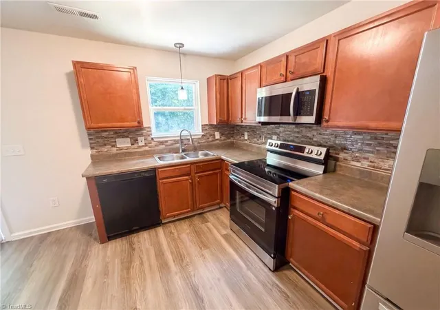 2nd image of 1131 Langston Dr, Greensboro, NC 27405 | MLS# 1231797