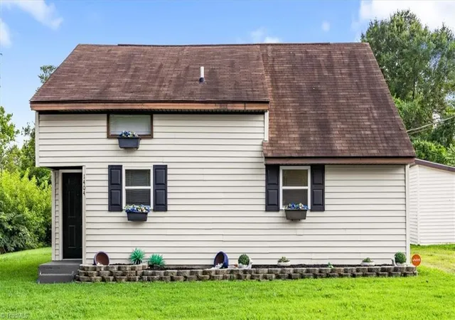 Photo 2 of Single family home for sale at 1404 Denim Rd, Greensboro, NC 27405 | MLS# 1230714 | Listing updated on 2026-09-11