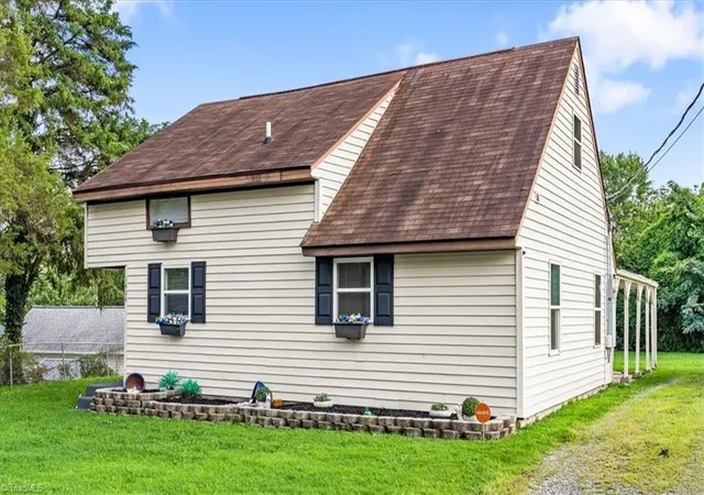 Photo 3 of Single family home for sale at 1404 Denim Rd, Greensboro, NC 27405 | MLS# 1230714 | Listing updated on 2026-09-11