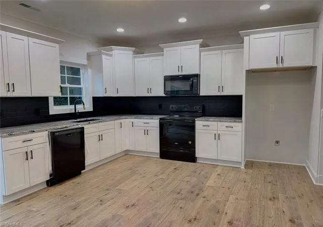 Photo 2 of Single family home for sale at 5040 Whitewood Ln, Winston Salem, NC 27104 | MLS# 1201498 | Listing updated on 2026-07-02