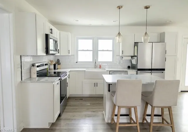 Photo 4 of Single family home for sale at 5236 Sweetwater Ct, Greensboro, NC 27407 | MLS# 1227778 | Listing updated on 2026-09-13