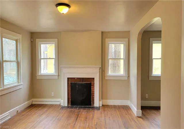 Photo 2 of Single family home for sale at 1009 Logan St, Greensboro, NC 27406 | MLS# 1225984 | Listing updated on 2026-09-01