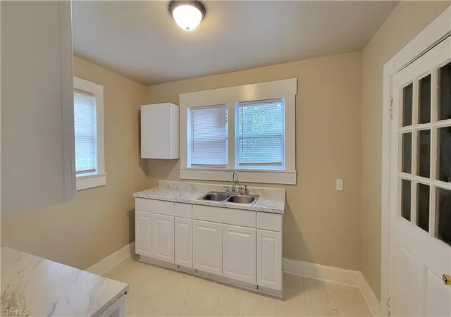 Photo 4 of Single family home for sale at 1009 Logan St, Greensboro, NC 27406 | MLS# 1225984 | Listing updated on 2026-09-01
