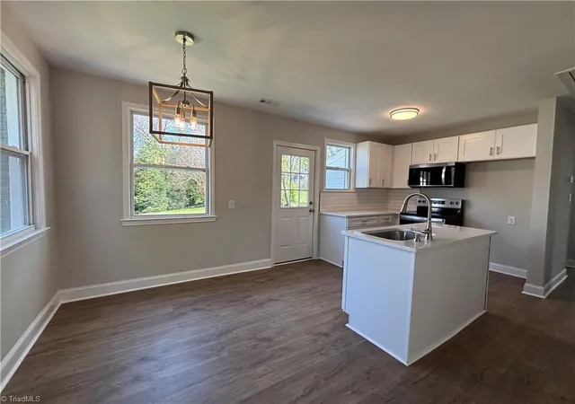 Photo 2 of Single family home for sale at 1331 Revere Rd, Winston Salem, NC 27103 | MLS# 1213702 | Listing updated on 2026-10-01