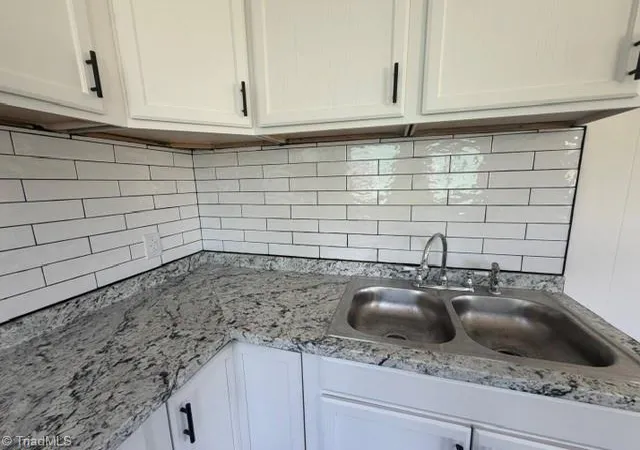 Photo 4 of Single family home for sale at 1048 E Clemmonsville Rd, Winston Salem, NC 27107 | MLS# 1229991 | Listing updated on 2026-09-17