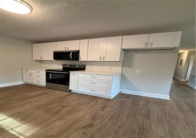Photo 3 of Single family home for sale at 1348 Calvert Dr, Winston Salem, NC 27107 | MLS# 1225550 | Listing updated on 2026-09-09