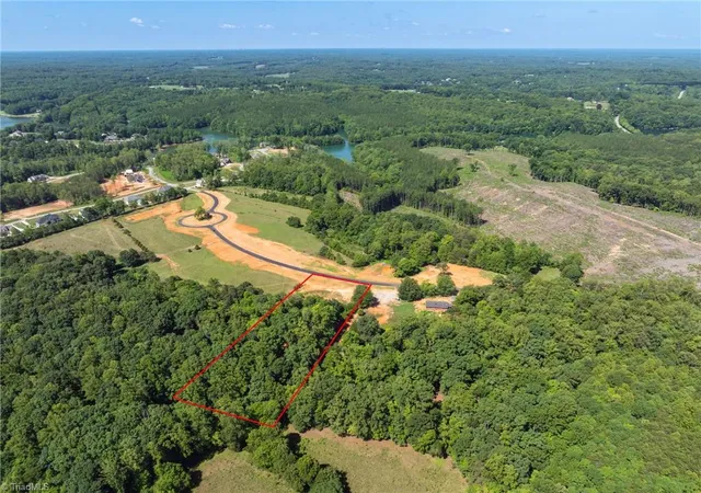 Photo 1 of Land for sale at 7289 Plunkett Rd, Belews Creek, NC 27009 | MLS# 1227341 | Listing updated on 2026-07-11