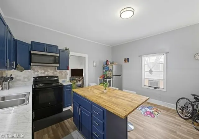 Photo 3 of House for sale at 815 Milton St, Greensboro, NC 27403 | MLS# 1195919 | Listing updated on 2026-06-15